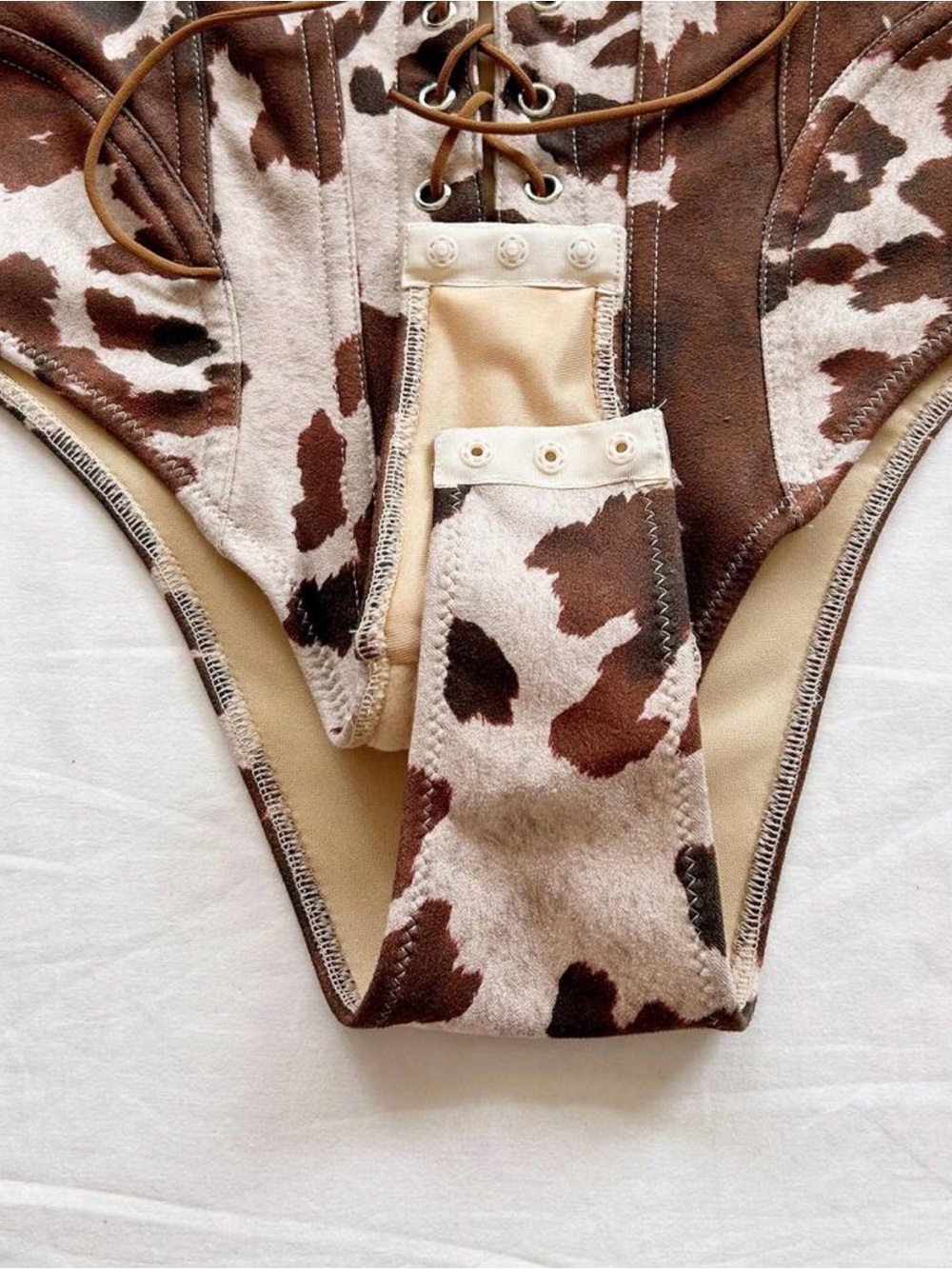Cow Print Lace-Up One-Piece bodysuit in Brown - Picture 4 of 5